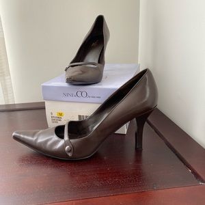 Brown pointed heels